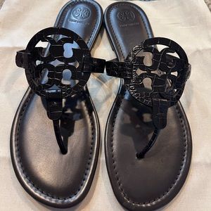 Brand new Tory Burch sandals, dust bag included.